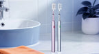 Sonic Rechargeable Electric Toothbrush with 4 Replacement Heads